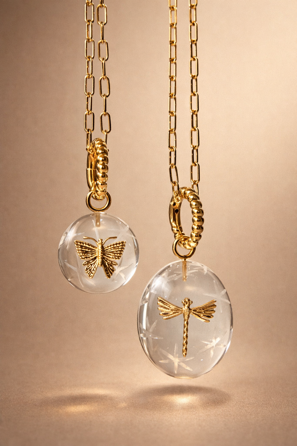 crystal quartz pendant with butterfly and dragonfly in brass